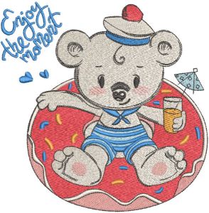 Teddy bear resting in the pool embroidery design