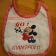 Embroidered baby bib with Mickey Mouse Racing design on it