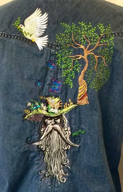 Denim jacket with root man embroidery design