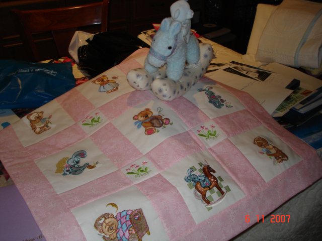 baby quilt with old toys machine embroidery design