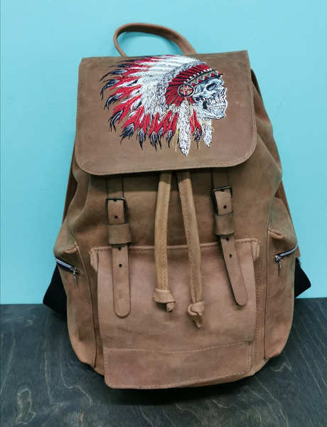 Embroidered backpack with indian skull design