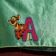 Tigger letter A embroidered on home theatre