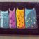 embroidered clutch with funny cats design