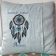 Embroidered pillow with dreamcatcher design