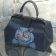 Woman bag with Cheshire cat embroidery