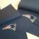 New England Patriots logo embroidered on blue pillowcase