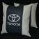 Embroidered pillow with Toyota log