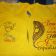 Yellow t-shirts embroidered with girlish designs
