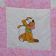 Embroidered quilt with Pluto
