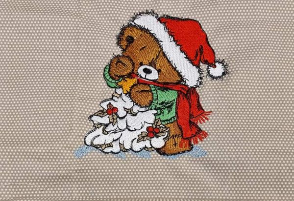 Embroidered winter teddy bear design