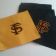 Embroidered San Francisco Giants logo on yellow and black pillowcases