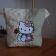 Hello kitty with rose design on embroidered beige bag