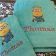 Two blue bath towels with Minion embroidery design