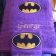 Batman logo embroidered on purple towel