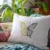 pillow with butterfly embroidery design living room featuring kitsch style