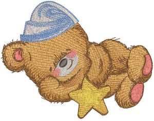 Sleeping teddy bear in nightcap with star