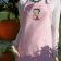 Embroidered pink apron with Betty Boop on it