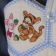 Nappy bag embroidered with Tigger and Piglet collecting acorns design