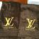 Embroidered Louis Vuitton logo on towel
