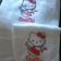 White embroidered towel with Hello Kitty cupid 