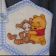 Pooh hugs Tigger embroidered on nappy bag