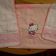 Hello Kitty Happy Angel design embroidered on towel and bib