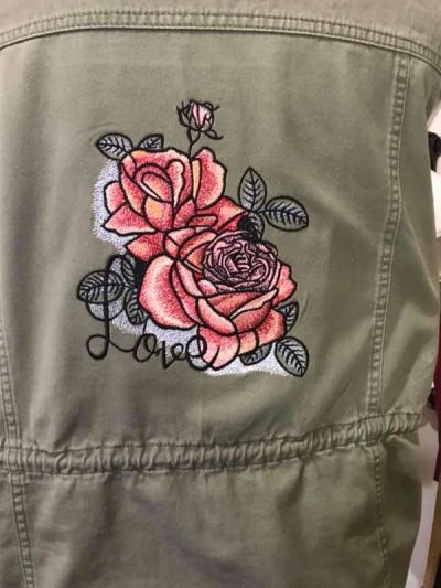 Embroidered denim jacket with loving rose design