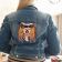 Girl dressed embroidered denim jacket