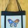 Night and Day butterfly embroidered on white summer bag