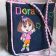 Happy Dora embroidered on bag