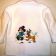 Mickey Mouse and Pluto embroidered on jacket