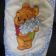 Baby Pooh with bouquet of chamomiles embroidered