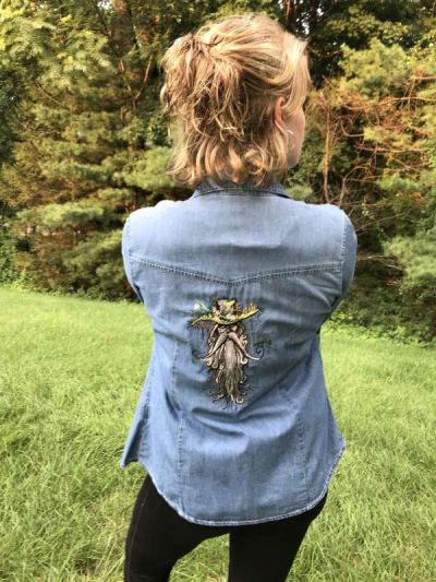 Embroidered denim jacket with root man design