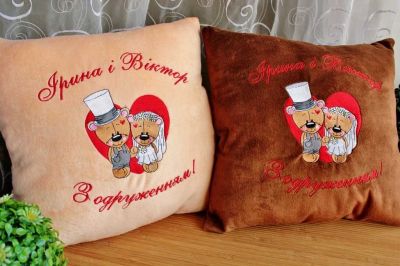Embroidered cushion as gift.
