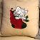 Embroidered cushion with christmas kitten design