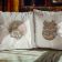 two created pillows with fox embroidery design in styled setting