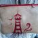 Small leather bag with lighthouse free embroidery design