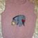 Eeyore design on knitted jacket embroidered
