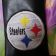 Black bag with embroidered Pittsburgh Steelers logo on it