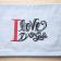Embroidered napkin with i love dogs design