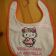 Baby bib embroidered with Hello Kitty spring design 