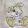 White bunny on embroidered towel