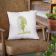 square pillow with summer rain embroidery design leather chair