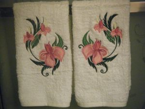 Two towels with elegant flower embroidery design
