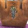 Leather bag with Root man embroidery design