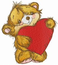 Fluffy bear with heart pillow