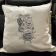 embroidered cushion with sea ship design
