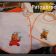 Baby bib and bath towel embroidered with Winnie Pooh designs