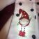 Embroidered Christmas gnome design on towel