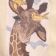 Embroidered giraffe with birdies design